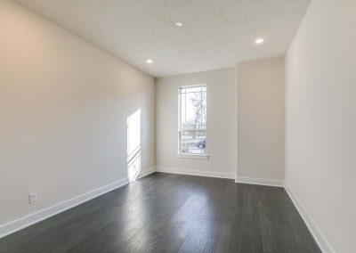 White room with hard wood floors