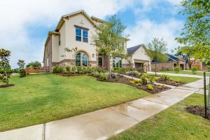 Home front with lawn and landscaping