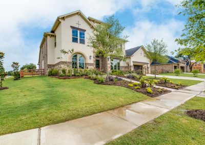 Home front with lawn and landscaping